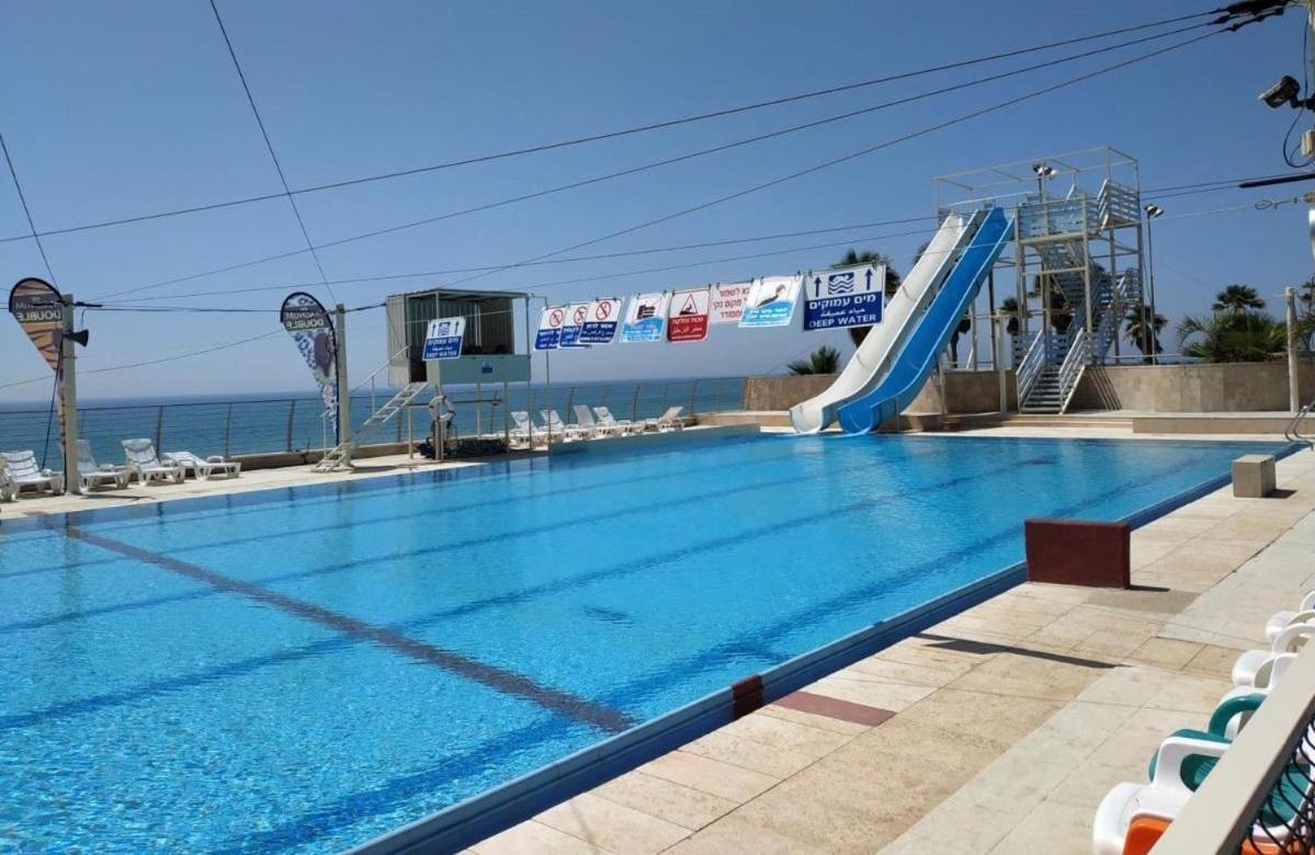 Almog Tower Aparthotel Haifa Bagian luar foto