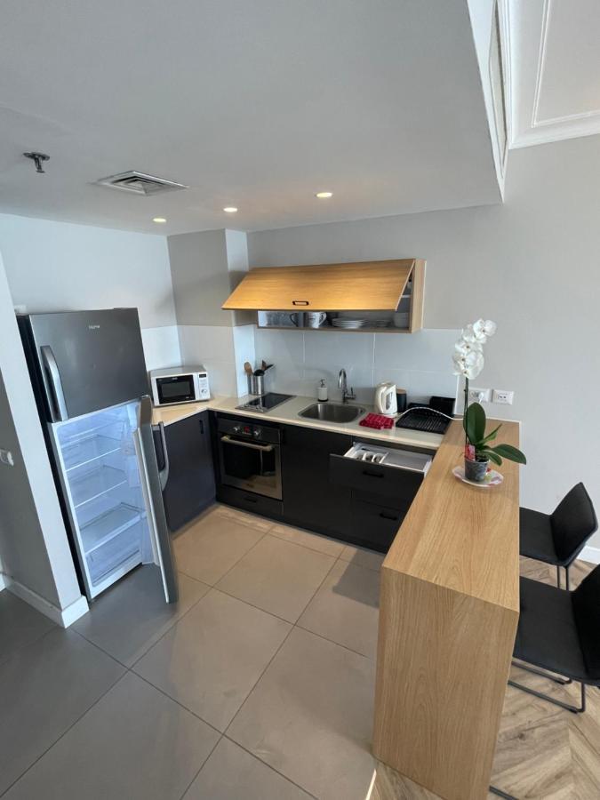 Almog Tower Aparthotel Haifa Bagian luar foto